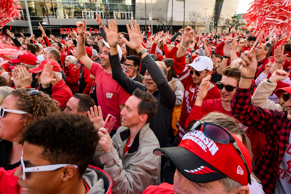 Hundreds of UW Badger fans take part in Jump Around during the UW-Madison Rose Bowl Pep Rally