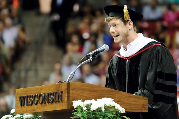 Anders Holm speaking at commencement