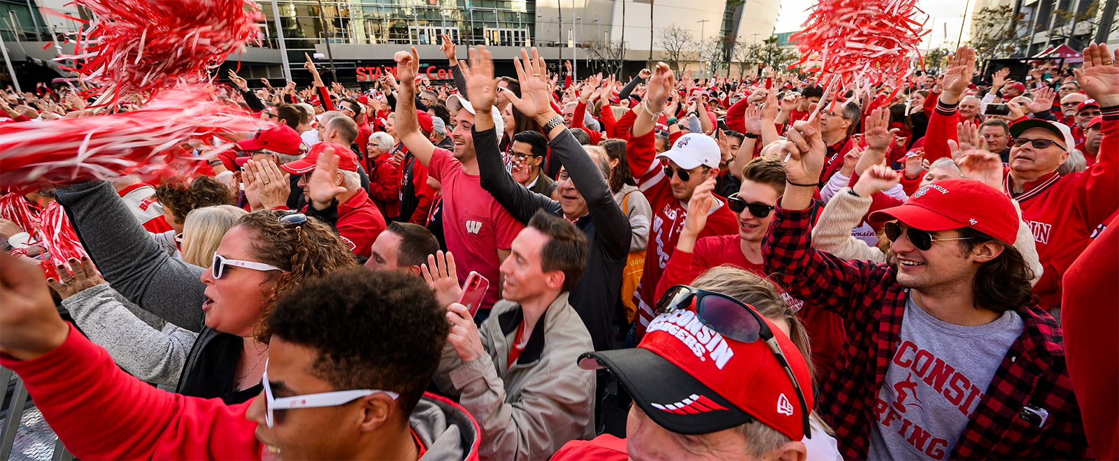 Hundreds of UW Badger fans take part in Jump Around during the UW-Madison Rose Bowl Pep Rally