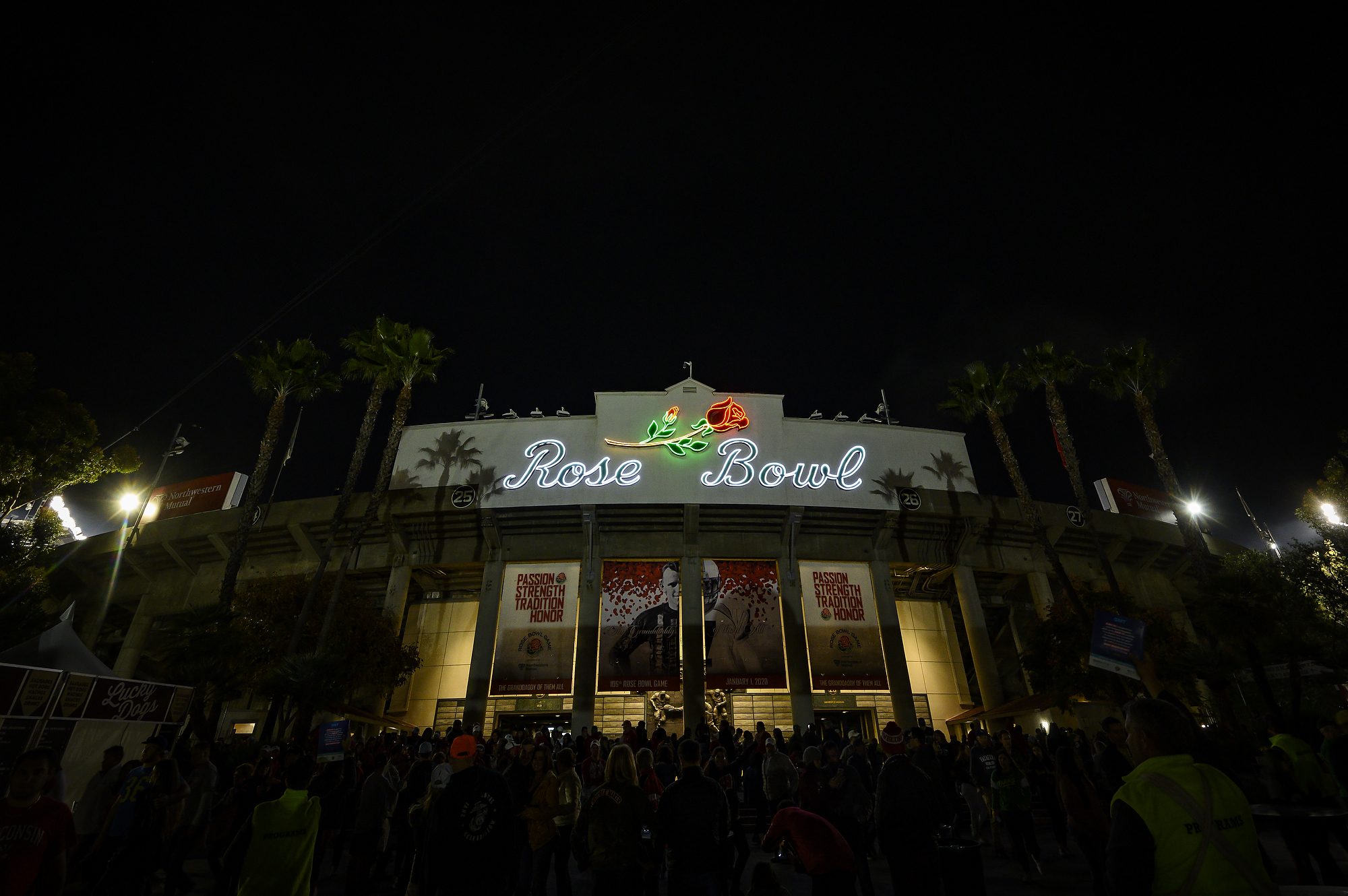 Fans leave the stadium following the conclusion of the Rose Bowl Game in Pasadena, California on Jan. 1, 2020.